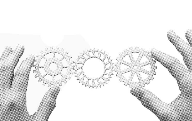 man holding gears