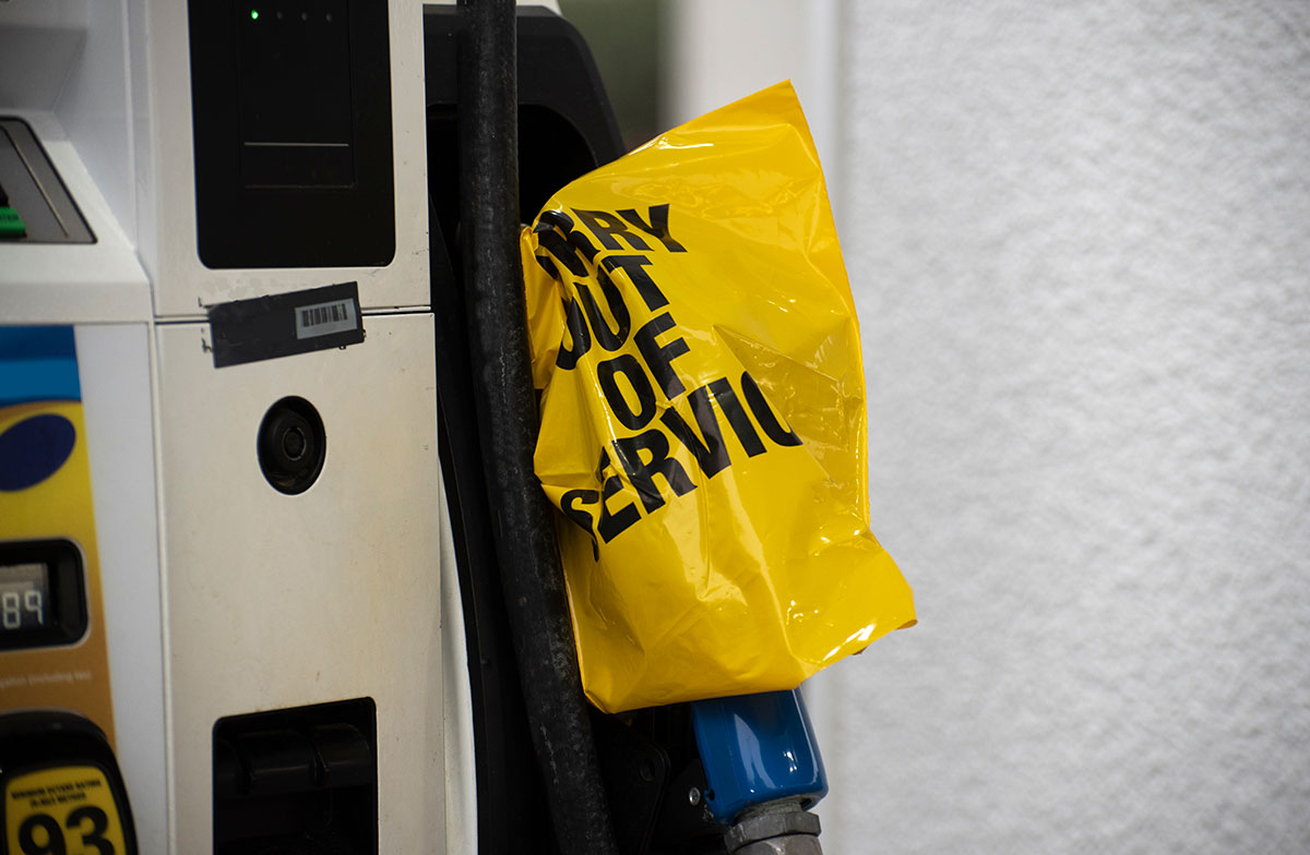 gas pump with bag over handle