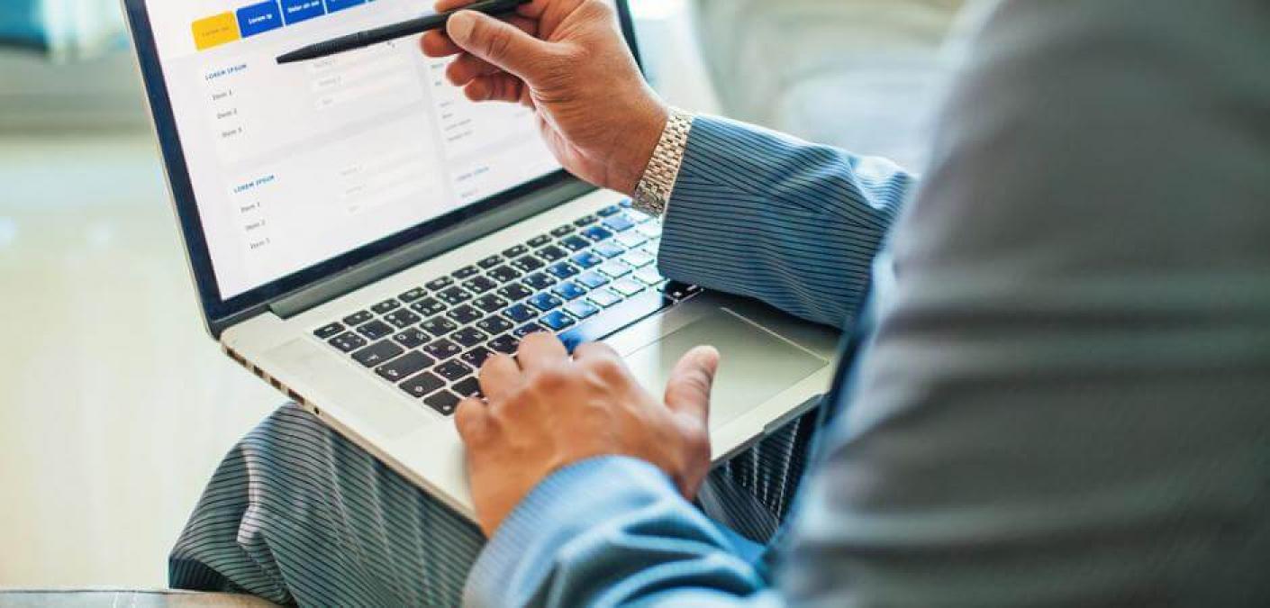 man using laptop